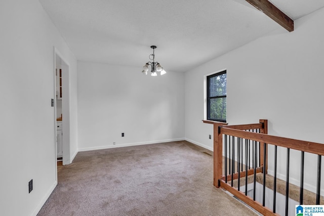 1117 Oak Creek Trl NE, Pinson, AL 35215 - carpeted empty room with a chandelier and beam ceiling