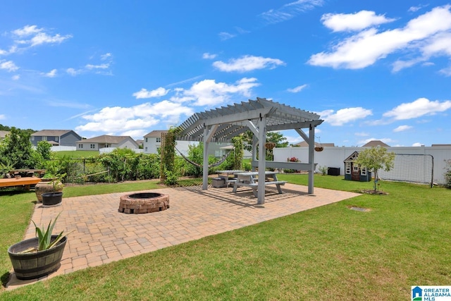 1009 Canvasback Way, Alabaster, AL 35007 - fenced backyard with a fire pit, a pergola, and a patio