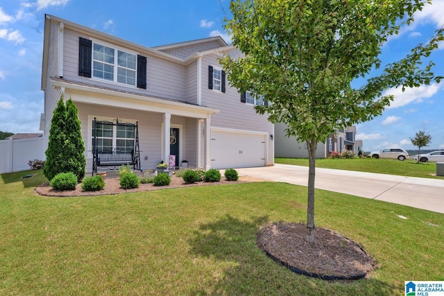 1009 Canvasback Way, Alabaster, AL 35007 - view of front of house featuring concrete driveway, a porch, and a garage