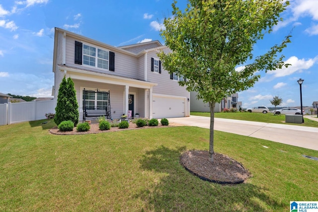 1009 Canvasback Way, Alabaster, AL 35007 - view of front of home with concrete driveway, an attached garage, and covered porch