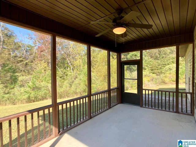 168 Willow View Ln, Westover, AL 35186 - unfurnished sunroom featuring a ceiling fan and a forest view