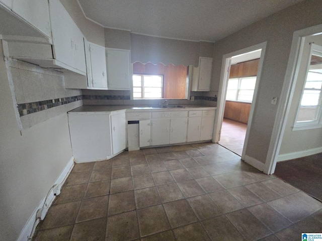 1414 27th St, Birmingham, AL 35218 - kitchen featuring a sink and white cabinetry