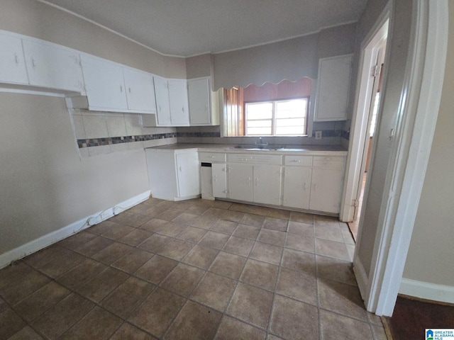 1414 27th St, Birmingham, AL 35218 - kitchen with white cabinetry
