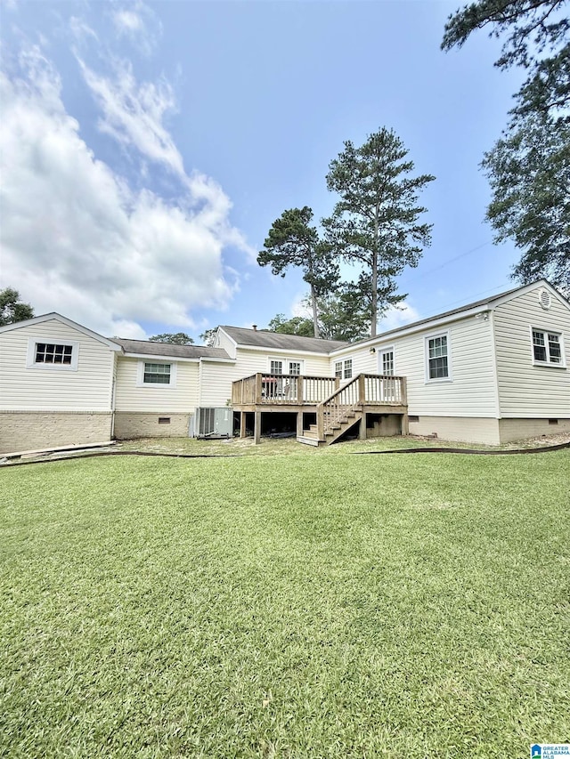 115 Ridgeway Ave, Gadsden, AL 35901 - back of house featuring crawl space, a deck, and a yard