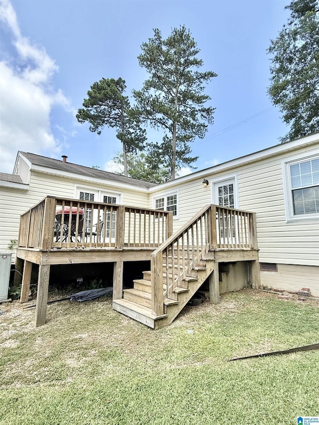 115 Ridgeway Ave, Gadsden, AL 35901 - rear view of property featuring a lawn and a deck