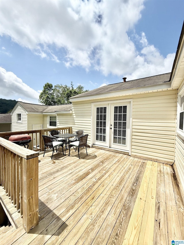 115 Ridgeway Ave, Gadsden, AL 35901 - wooden deck featuring outdoor dining area and french doors