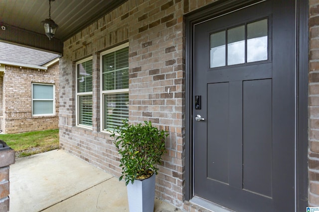 319 Glen Cross Way, Trussville, AL 35173 - view of exterior entry with brick siding and a porch