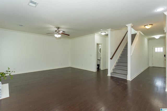 319 Glen Cross Way, Trussville, AL 35173 - unfurnished living room with ceiling fan, stairway, crown molding, and dark wood-type flooring