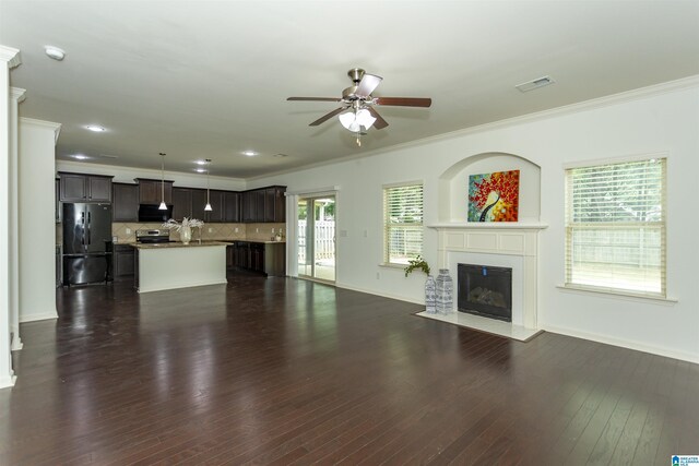 319 Glen Cross Way, Trussville, AL 35173 - unfurnished living room with a ceiling fan, crown molding, a fireplace with flush hearth, and dark wood finished floors