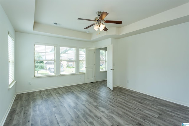 319 Glen Cross Way, Trussville, AL 35173 - unfurnished room featuring a ceiling fan, a raised ceiling, and wood finished floors