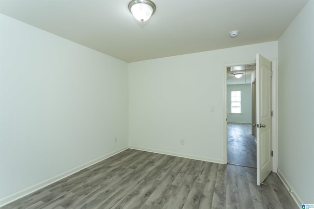319 Glen Cross Way, Trussville, AL 35173 - empty room with wood finished floors, a smoke detector, and attic access