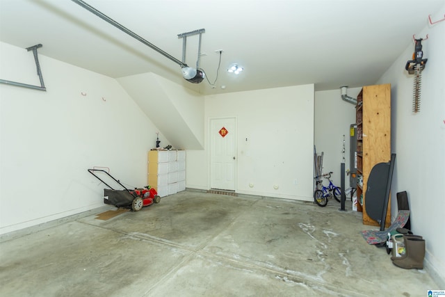 319 Glen Cross Way, Trussville, AL 35173 - garage featuring a garage door opener and baseboards