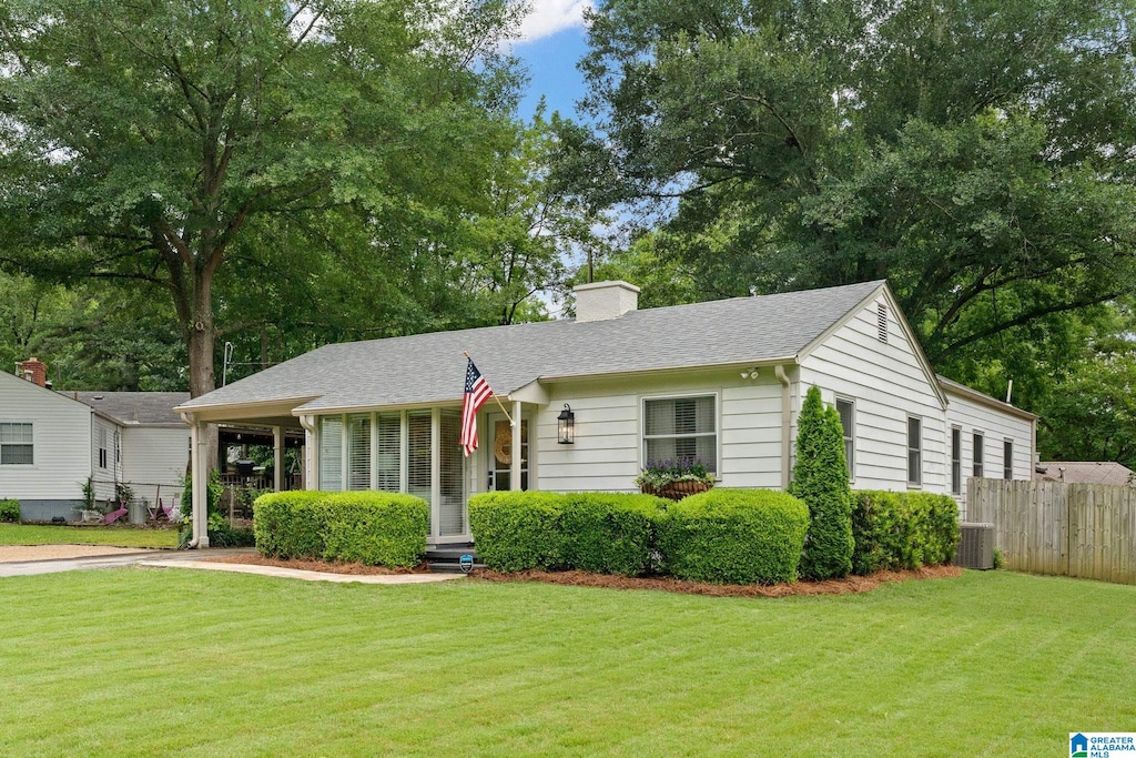 1119 Monarch Ave, Birmingham, AL 35213 - view of front facade with a chimney, roof with shingles, and a porch
