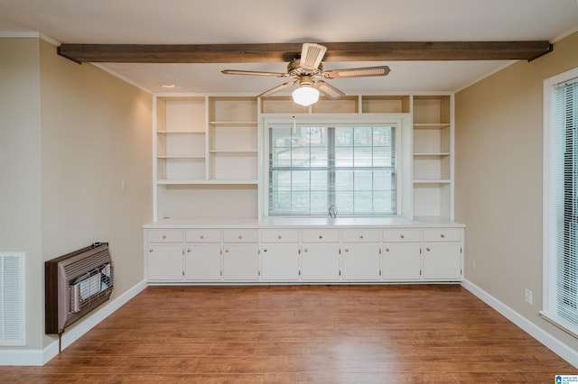 840 Black Acres Rd, Cropwell, AL 35054 - unfurnished living room featuring beamed ceiling, heating unit, light wood-style flooring, a ceiling fan, and ornamental molding
