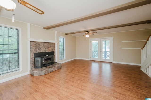 840 Black Acres Rd, Cropwell, AL 35054 - unfurnished living room with a ceiling fan, wood finished floors, stairs, and beam ceiling