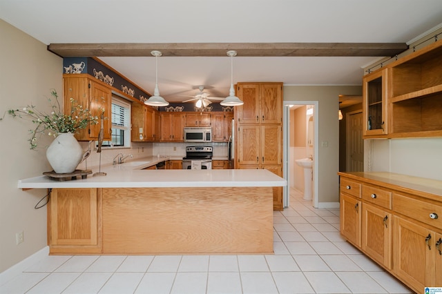 840 Black Acres Rd, Cropwell, AL 35054 - kitchen with appliances with stainless steel finishes, light countertops, a peninsula, a ceiling fan, and pendant lighting