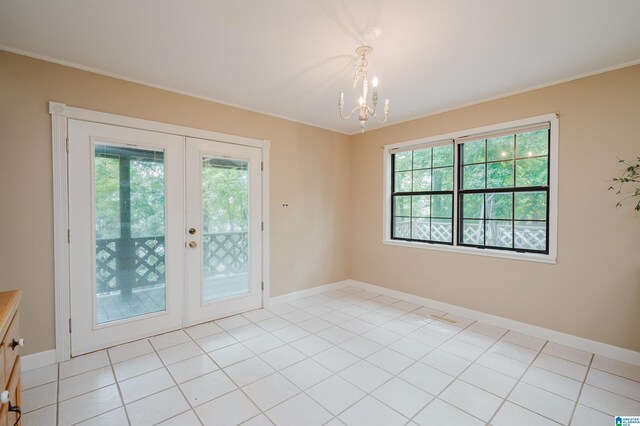 840 Black Acres Rd, Cropwell, AL 35054 - unfurnished room featuring french doors, a chandelier, and ornamental molding