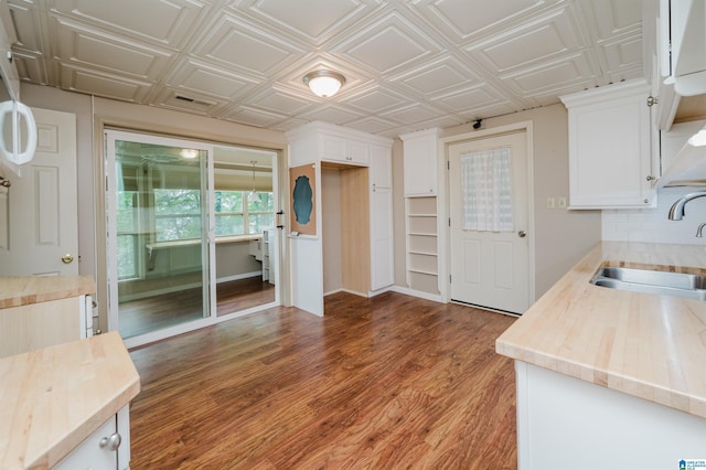 840 Black Acres Rd, Cropwell, AL 35054 - kitchen featuring wooden counters, white cabinetry, wood finished floors, and an ornate ceiling