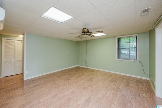 840 Black Acres Rd, Cropwell, AL 35054 - empty room with light wood-style floors, a ceiling fan, and a drop ceiling