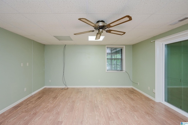 840 Black Acres Rd, Cropwell, AL 35054 - unfurnished room with a paneled ceiling, light wood finished floors, and ceiling fan