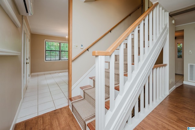 840 Black Acres Rd, Cropwell, AL 35054 - stairs with a wall mounted air conditioner and wood finished floors