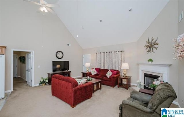 423 Camden Cove Cir, Calera, AL 35040 - living area featuring high vaulted ceiling, light colored carpet, a ceiling fan, and a fireplace