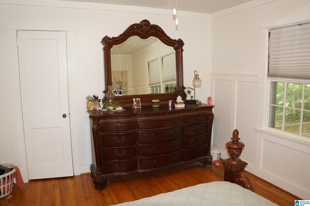 702 4th St SW, Childersburg, AL 35044 - bedroom with wood finished floors