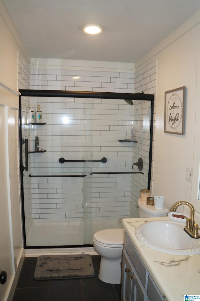 702 4th St SW, Childersburg, AL 35044 - full bathroom with a shower stall and vanity