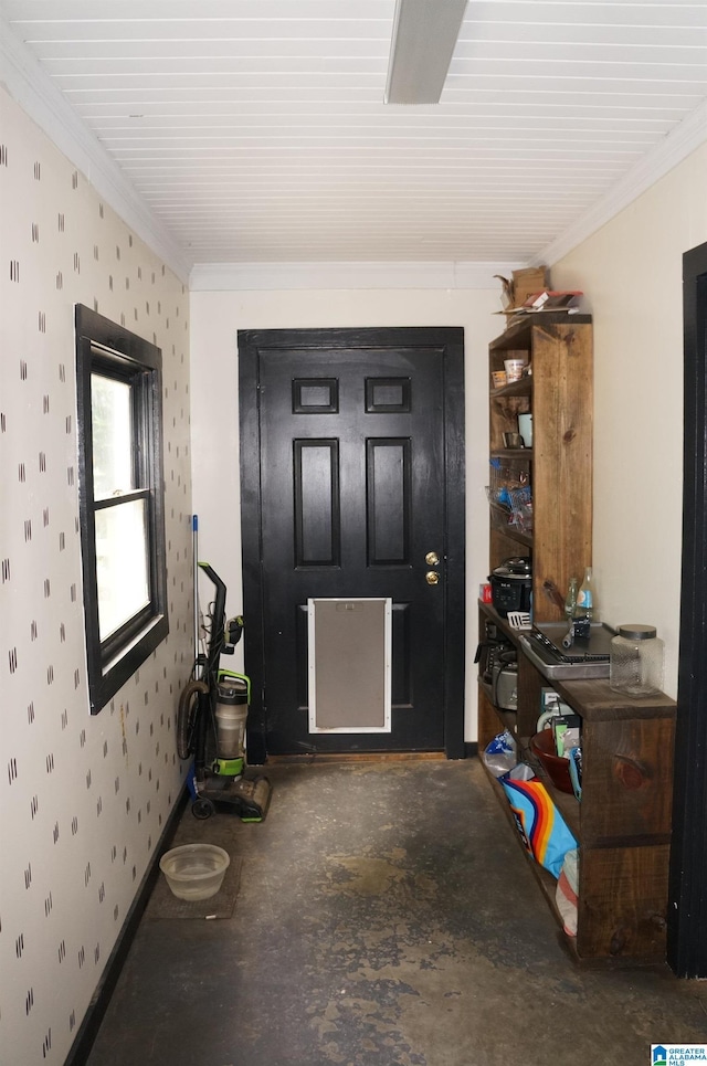 702 4th St SW, Childersburg, AL 35044 - foyer entrance featuring ornamental molding and concrete floors