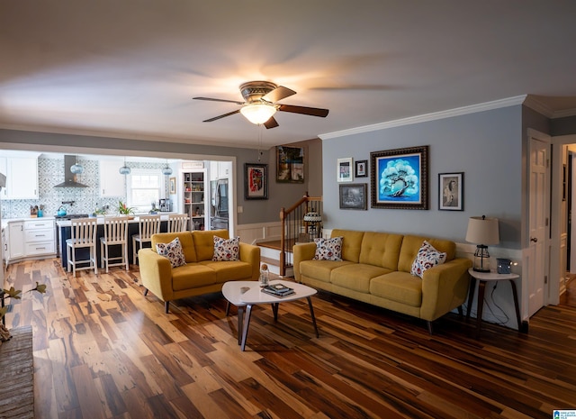 7835 Windsong Dr, Trussville, AL 35173 - living area featuring wood finished floors, ornamental molding, and a ceiling fan
