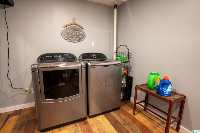 7835 Windsong Dr, Trussville, AL 35173 - laundry room featuring washer and clothes dryer and wood finished floors