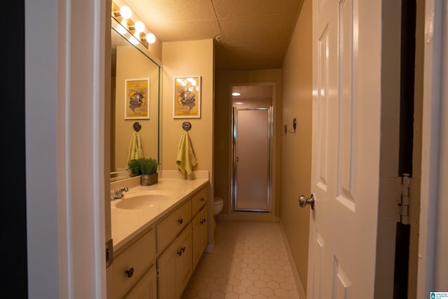 7835 Windsong Dr, Trussville, AL 35173 - full bath featuring vanity, tile patterned flooring, a shower stall, and a paneled ceiling