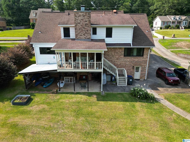 7835 Windsong Dr, Trussville, AL 35173 - back of property featuring roof with shingles, a patio, and a yard