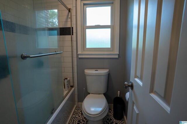 7835 Windsong Dr, Trussville, AL 35173 - full bath with bath / shower combo with glass door and tile patterned floors