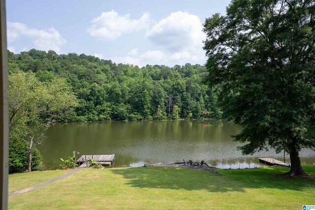 7835 Windsong Dr, Trussville, AL 35173 - water view featuring a floating dock and a heavily wooded area