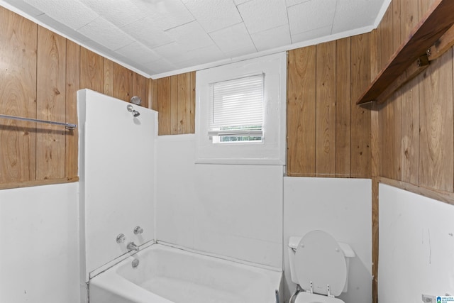 606 W Pine St, Sylacauga, AL 35150 - full bathroom with shower / bath combination and wood walls