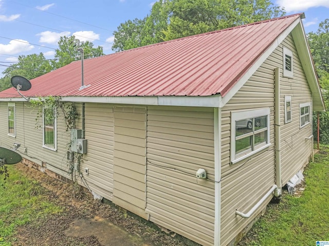 606 W Pine St, Sylacauga, AL 35150 - view of side of property with a metal roof