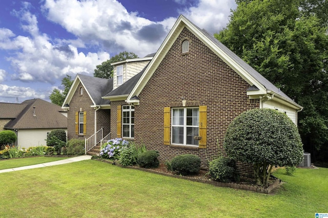 3130 Cahaba Park Dr, Trussville, AL 35173 - view of front of home with brick siding, a front lawn, and an attached garage