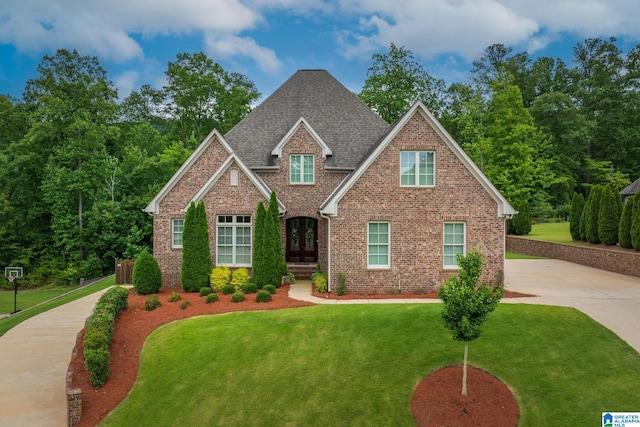 2000 Regency Way, Birmingham, AL 35242 - view of front of property featuring french doors, brick siding, a front yard, and roof with shingles