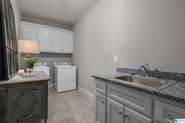 2000 Regency Way, Birmingham, AL 35242 - laundry area featuring cabinet space and washing machine and dryer