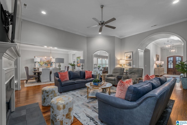 2000 Regency Way, Birmingham, AL 35242 - living room featuring arched walkways, a chandelier, wood finished floors, recessed lighting, and crown molding