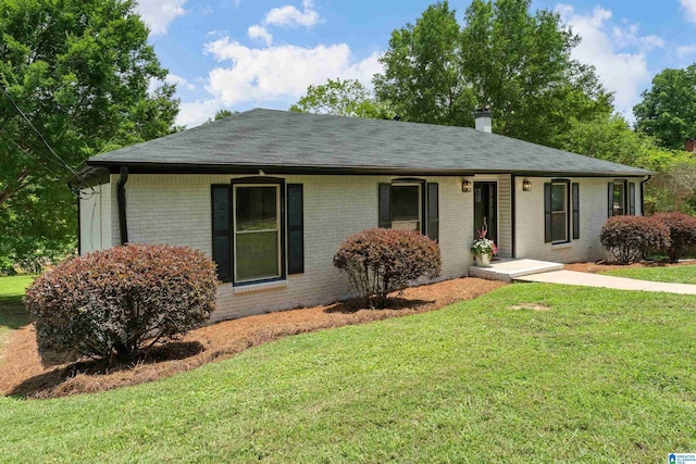 3317 Teakwood Rd, Hoover, AL 35226 - ranch-style home with brick siding, a front lawn, and roof with shingles
