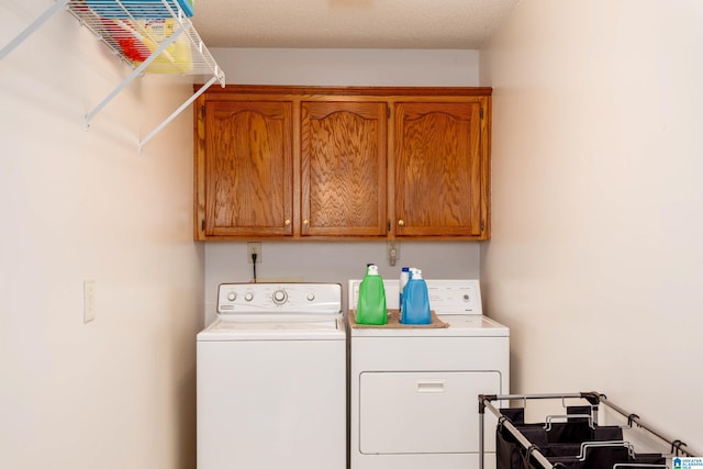 20571 Faynell Cir, Woodstock, AL 35188 - laundry area featuring independent washer and dryer and cabinet space