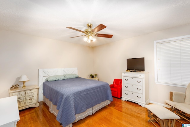 20571 Faynell Cir, Woodstock, AL 35188 - bedroom with light wood-style floors and a ceiling fan