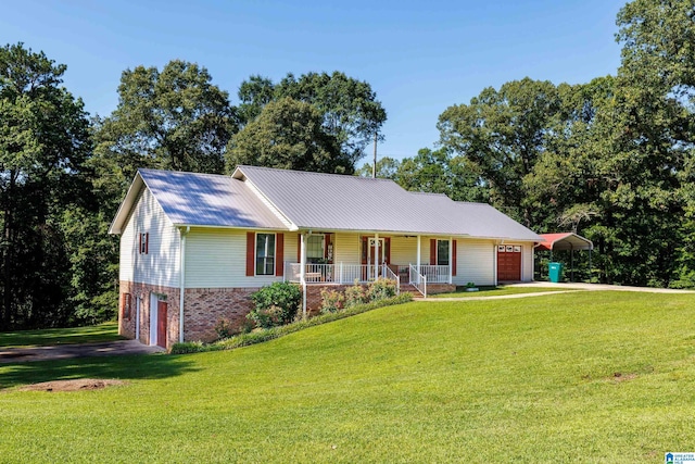 20571 Faynell Cir, Woodstock, AL 35188 - view of front of home featuring a porch, driveway, brick siding, a garage, and a front yard