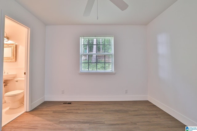 442 Lakeview Cir, Alpine, AL 35014 - spare room with wood finished floors and a ceiling fan