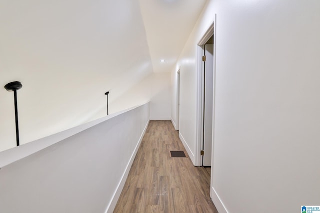 442 Lakeview Cir, Alpine, AL 35014 - hall featuring wood finished floors, vaulted ceiling, and recessed lighting