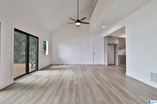 442 Lakeview Cir, Alpine, AL 35014 - spare room with light wood-style flooring, ceiling fan, and high vaulted ceiling