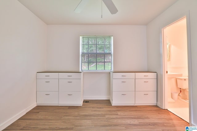 442 Lakeview Cir, Alpine, AL 35014 - unfurnished bedroom with light wood-type flooring, ensuite bath, and ceiling fan