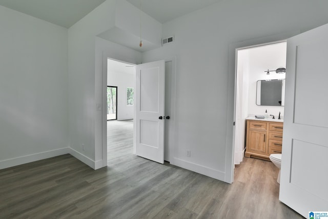 442 Lakeview Cir, Alpine, AL 35014 - unfurnished bedroom with wood finished floors and ensuite bath